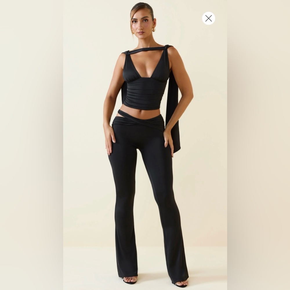 Oh Polly Shadi Cut-Out Mid-Rise Flared Trousers